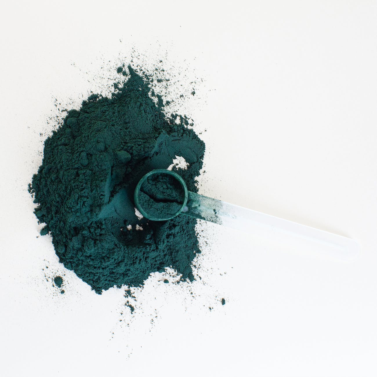 green powder on white table